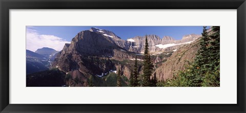 Framed Trees with a mountain range in the background, US Glacier National Park, Montana, USA Print