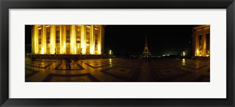 Framed Buildings lit up at night with a tower in the background, Eiffel Tower, Paris, France Print