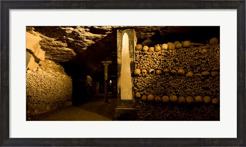 Framed Stacked bones in catacombs, Paris, Ile-de-France, France Print