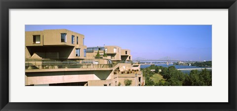 Framed Housing complex with a bridge in the background, Habitat 67, Jacques Cartier Bridge, Montreal, Quebec, Canada Print