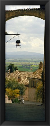 Framed Umbrian countryside viewed through an alleyway, Assisi, Perugia Province, Umbria, Italy Print