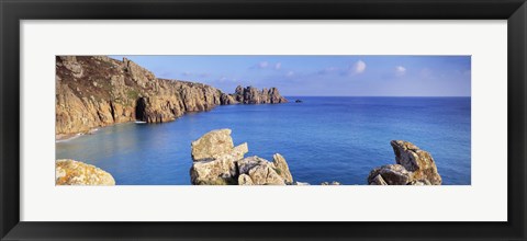 Framed Rock formations at seaside, Logan rock, Porthcurno Bay, Cornwall, England Print