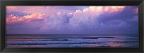 Framed Clouds over the sea at sunset Print