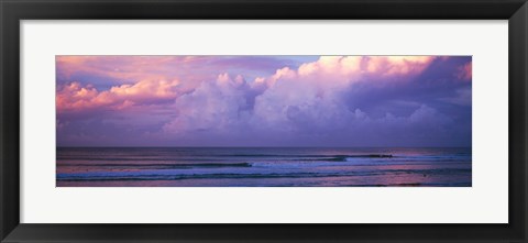 Framed Clouds over the sea at sunset Print