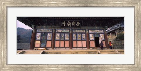 Framed Buddhist temple with a mountain range in the background, Kayasan Mountains, Haeinsa Temple, Gyeongsang Province, South Korea Print