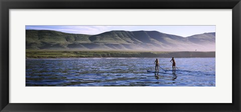 Framed Tourists paddleboarding in the pacific ocean, Santa Cruz Island, Santa Barbara County, California Print