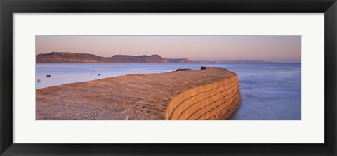 Framed Harbour wall at dusk, The Cobb, Lyme Regis, Dorset, England Print