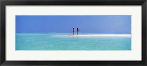 Framed Two women standing on the beach sandbar, Maayafushi Island, Ari Atoll, Maldives Print