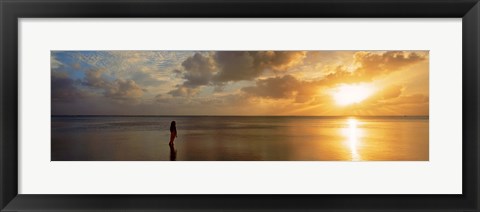 Framed Woman standing on sandbar looking at sunset, Aitutaki, Cook Islands Print