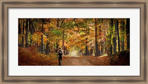 Framed Kid with backpack walking in fall colors Print