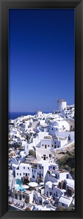 Framed Aerial view of houses in a town, Oia, Santorini, Cyclades Islands, Greece Print