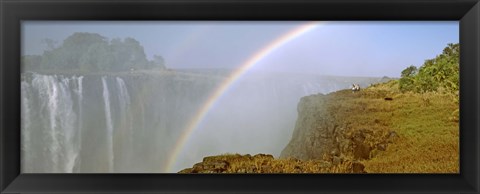 Framed Rainbow form in the spray created by the water cascading over the Victoria Falls, Zimbabwe Print