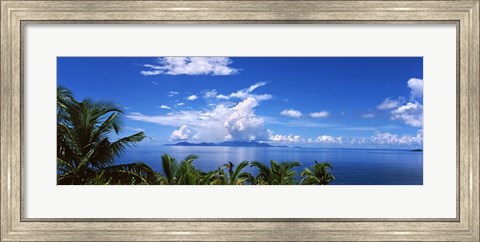 Framed Indian ocean with palm trees towards Mahe Island looking from North Island, Seychelles Print