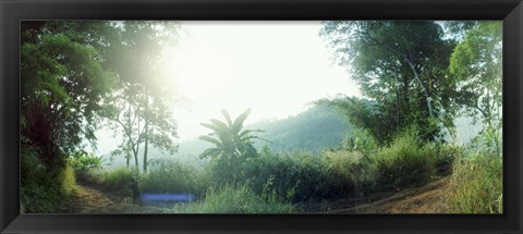 Framed Man with a slingshot in a forest, Chiang Mai, Thailand Print