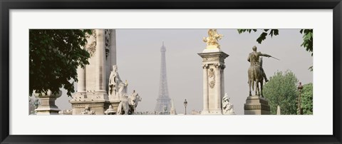 Framed Low angle view of a statue, Alexandre III Bridge, Eiffel Tower, Paris, France Print