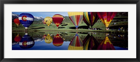 Framed Reflection of hot air balloons in a lake, Snowmass Village, Pitkin County, Colorado, USA Print