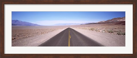 Framed USA, California, Death Valley, Empty highway in the valley Print