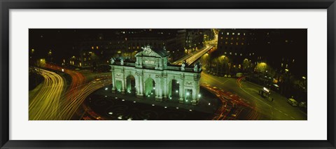 Framed High angle view of a monument lit up at night, Puerta De Alcala, Plaza De La Independencia, Madrid, Spain Print