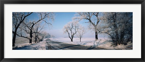 Framed Road passing through winter fields, Illinois, USA Print