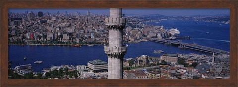 Framed Mid section view of a minaret with bridge across the bosphorus in the background, Istanbul, Turkey Print