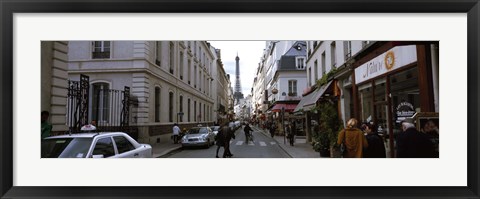 Framed Buildings along a street with a tower in the background, Rue Saint Dominique, Eiffel Tower, Paris, Ile-de-France, France Print