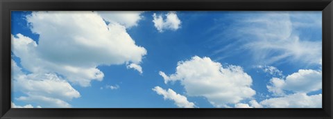 Framed Clouds against a pale blue sky Print