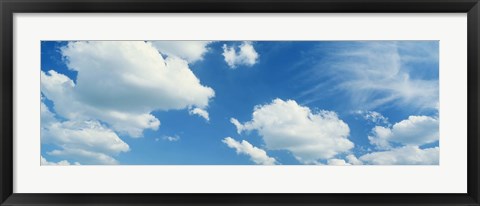 Framed Clouds against a pale blue sky Print