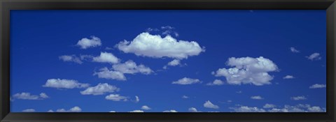 Framed Clouds against a deep blue sky Print