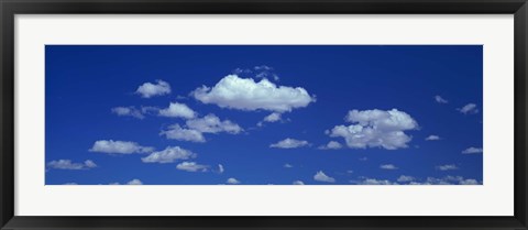 Framed Clouds against a deep blue sky Print