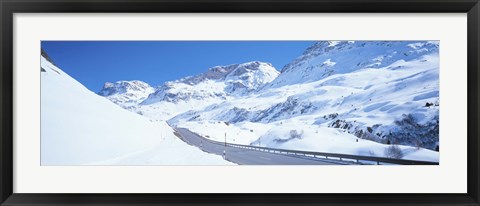 Framed Snow covered mountains on both sides of a road, St Moritz, Graubunden, Switzerland Print