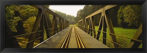 Framed Railroad tracks passing through a bridge, Germany Print