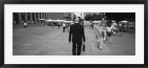 Framed Rear view of a businessman walking on the street, Stuttgart, Germany Print