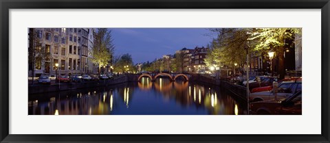 Framed Night View Along Canal Amsterdam The Netherlands Print