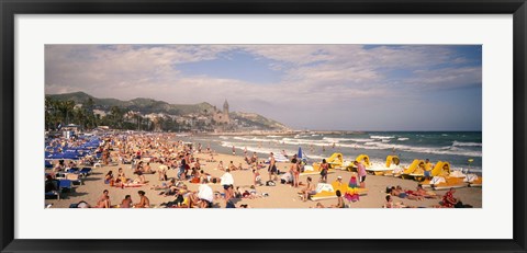 Framed Tourists on the beach, Sitges, Spain Print