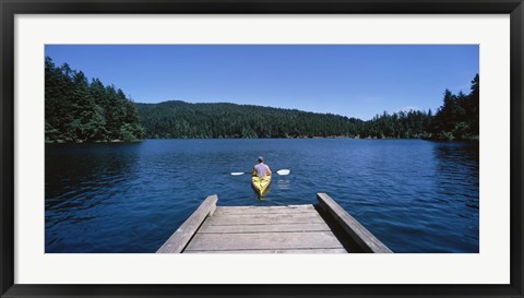 Framed Rear view of a man on a kayak in a river, Orcas Island, Washington State, USA Print