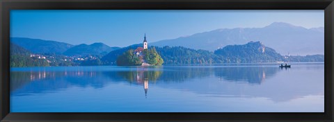 Framed Reflection of mountains and buildings in water, Lake Bled, Slovenia Print