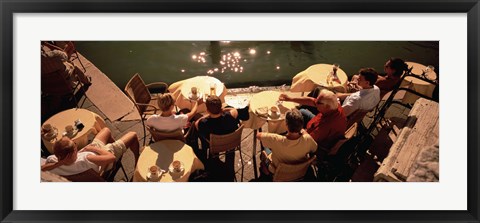 Framed High angle view of tourists sitting along a canal, Venice, Italy Print