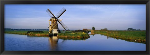 Framed Traditional Windmill On The Waterfront, Netherlands Print