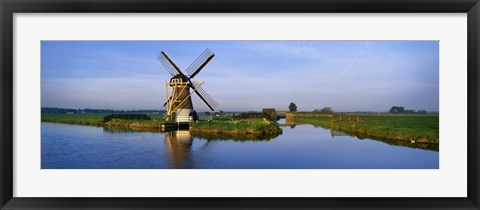 Framed Traditional Windmill On The Waterfront, Netherlands Print