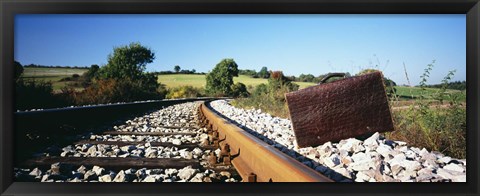 Framed Close-up of a suitcase on a railroad track, Germany Print