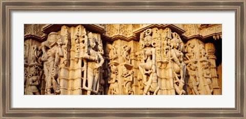 Framed Sculptures carved on a wall of a temple, Jain Temple, Ranakpur, Rajasthan, India Print