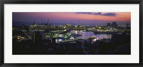 Framed High angle view of city at a port lit up at dusk, Genoa, Liguria, Italy Print