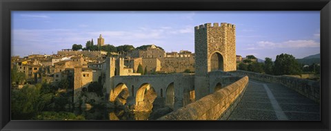 Framed Footbridge across a river in front of a city, Besalu, Catalonia, Spain Print