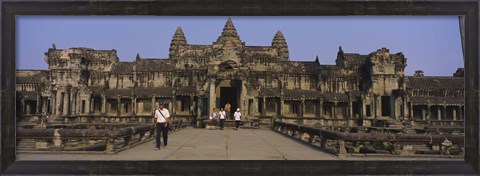 Framed Tourists walking in front of an old temple, Angkor Wat, Siem Reap, Cambodia Print