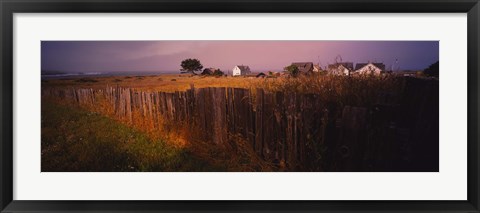 Framed Wooden fence in a field with houses in the background, Mendocino, California, USA Print