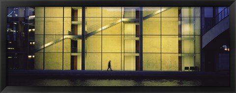 Framed Silhouette of a person walking in front of a building, Paul Lobe Haus, Berlin, Germany Print