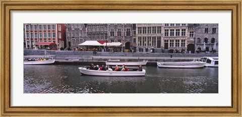 Framed High angle view of tourboats in a river, Leie River, Graslei, Ghent, Belgium Print
