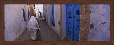 Framed Rear view of a woman walking on the street, Medina, Kairwan, Tunisia Print