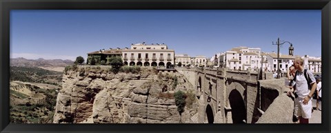 Framed Tourists standing on a bridge, Puente Nuevo, Ronda, Malaga Province, Andalusia, Spain Print