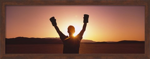 Framed Silhouette of a person wearing boxing gloves in a desert at dusk, Black Rock Desert, Nevada, USA Print